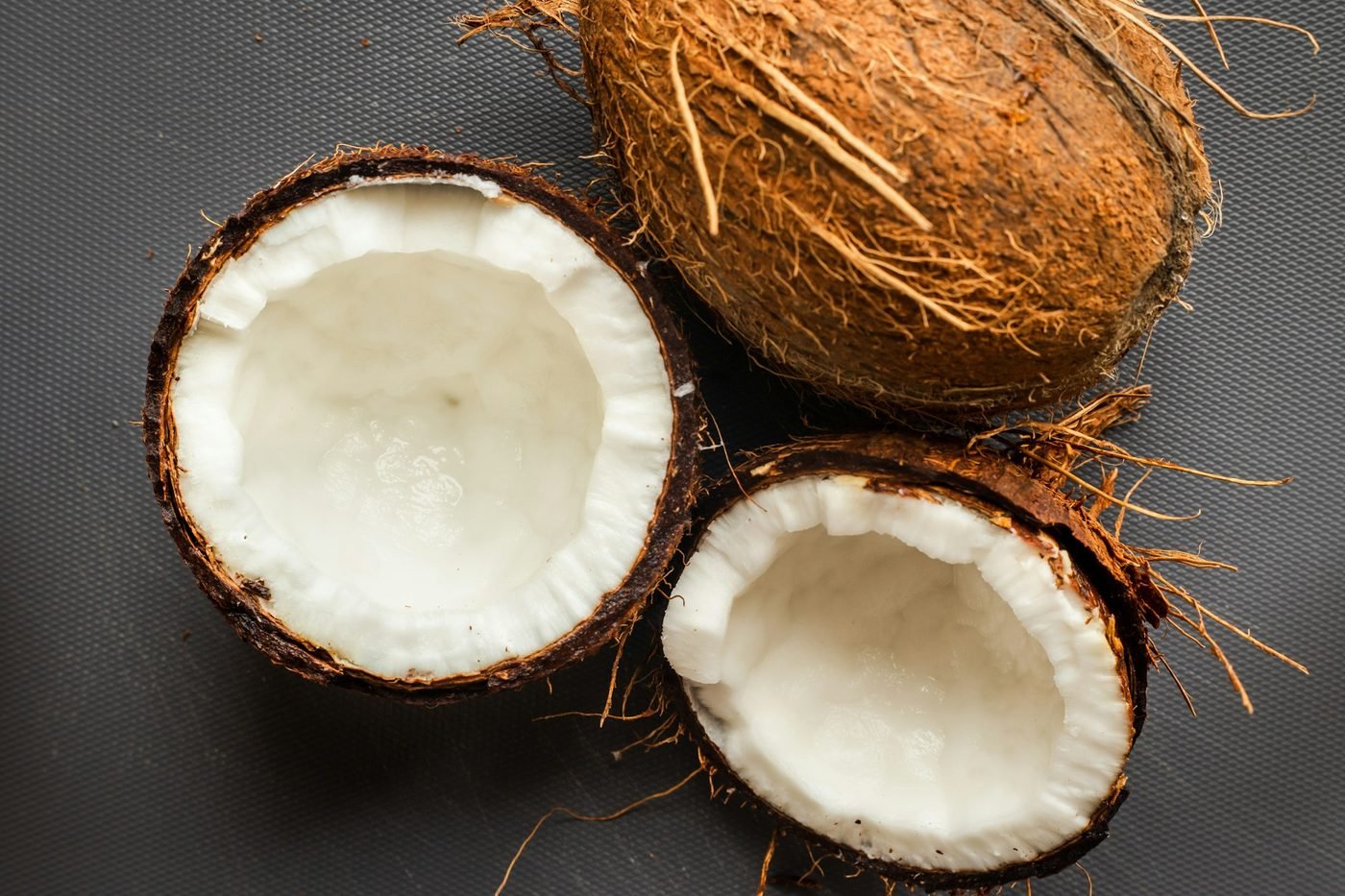 Halved fresh coconuts