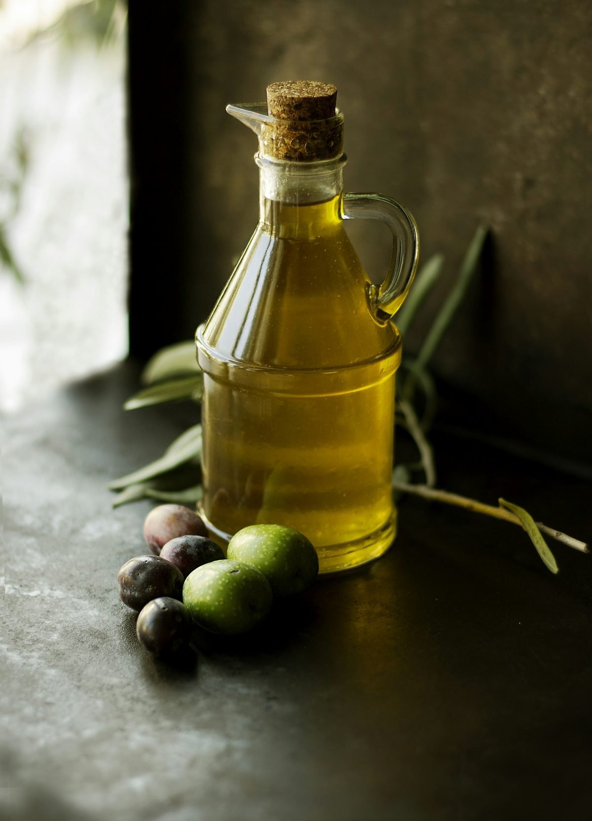 Golden oil in a glass bottle